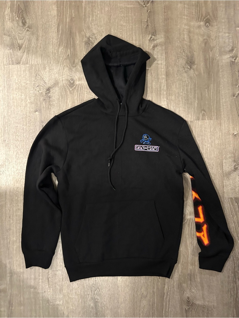 PAC Man Black Graphic Hoodie with Orange Sleeve Detail
